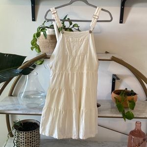 White ruffled overall dress